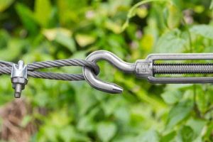 Turnbuckle in use for tensioning a wire rope